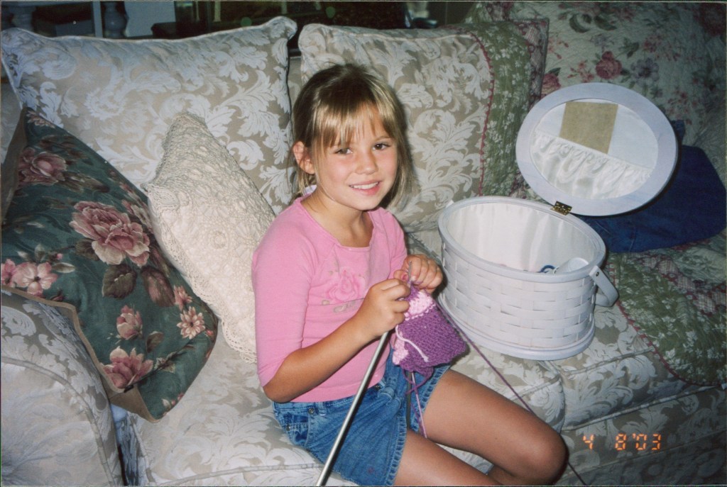 Elizabeth Toenyes knitting at age 8